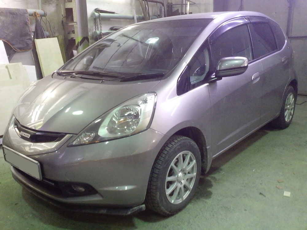 Чип тюнинг и удаление кислородных датчиков Honda FIT 2009